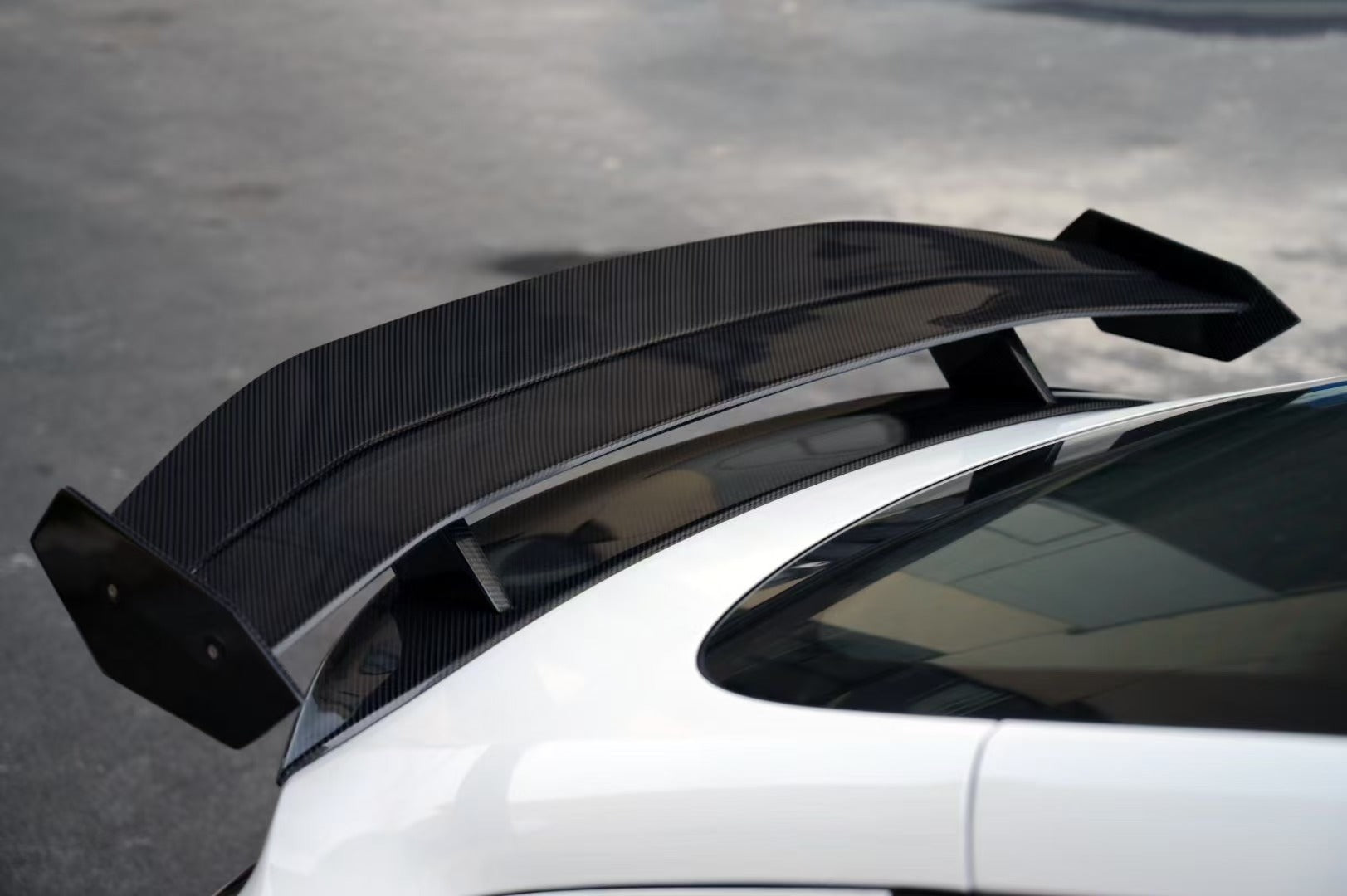 Tesla Model 3 Highland / Performance 2024 with Aftermarket Parts - V3 Rear Spoiler Carbon Fiber / FRP from Robot Craftsman Tesla Model 3 Highland / Performance 2024 with Aftermarket Parts - V3 Rear Spoiler Carbon Fiber / FRP from Robot Craftsman