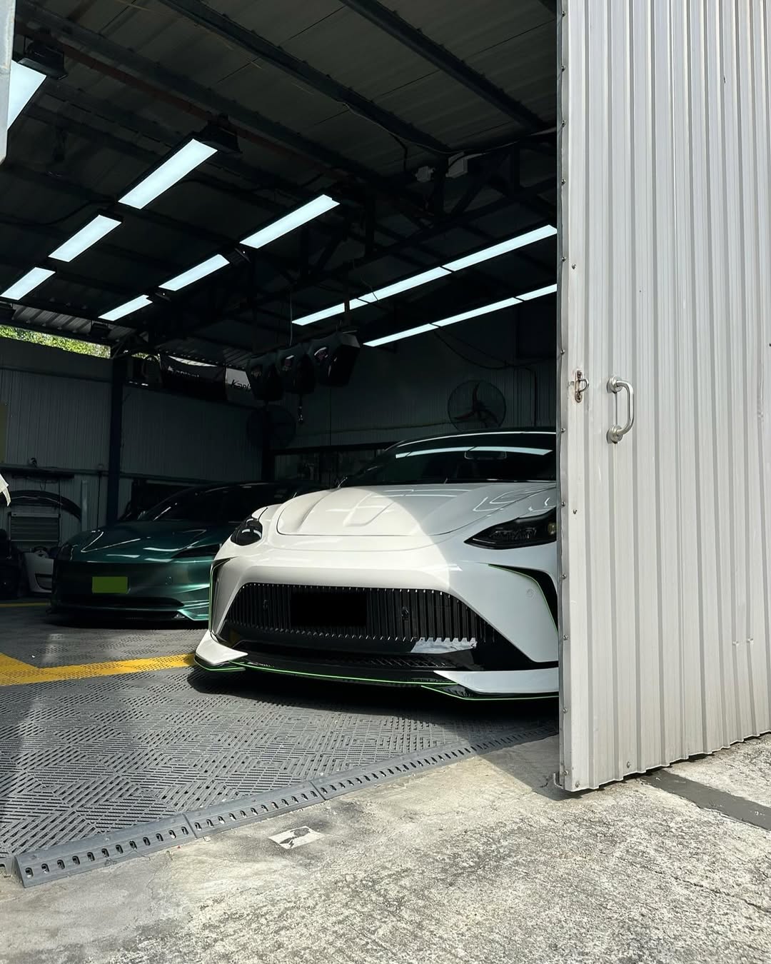 Tesla Model Y Performance AWD Long Range RWD Standard 2020 2021 2023 2024 with Aftermarket Parts - "STARSHIP" Stage 1 Corner Lip (2 pcs) & Stage 2 Corner Lip (4 pcs) & Front Bumper Carbon Fiber / FRP / PP from Robot Craftsman